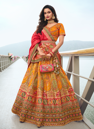 Silk Orange Bridal Zari Woven Stone Work Embroidered Lehenga With Orange Sequins Embroidered Choli