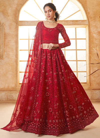 Red Embroidered Bridal Thread With Stone Embellishment And Stone Work Net Lehenga Choli