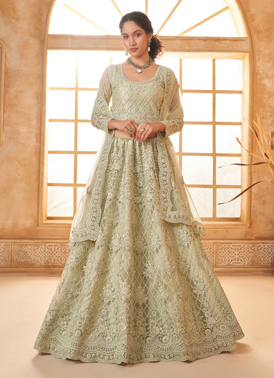 Pista Green Embroidered Bridal Thread With Stone Embellishment And Stone Work Net Lehenga Choli