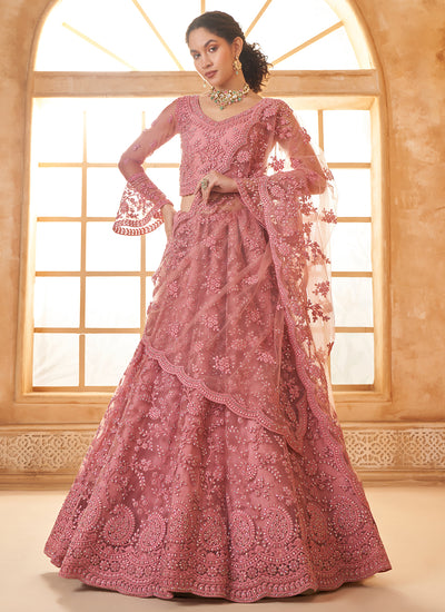 Pink Embroidered Bridal Thread With Stone Embellishment And Stone Work Net Lehenga Choli