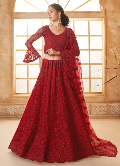 Designer Red Embroidered Bridal Thread With Stone Embellishment And Stone Work Net Lehenga Choli