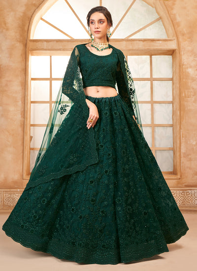 Dark Green Bridal Thread Embroidered With Stone Embellishment And Stone Work Net Lehenga Choli