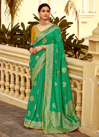 Green Mehendi Wear Zari Weaving Dola Silk Saree With Heavy Embroidery Yellow Blouse