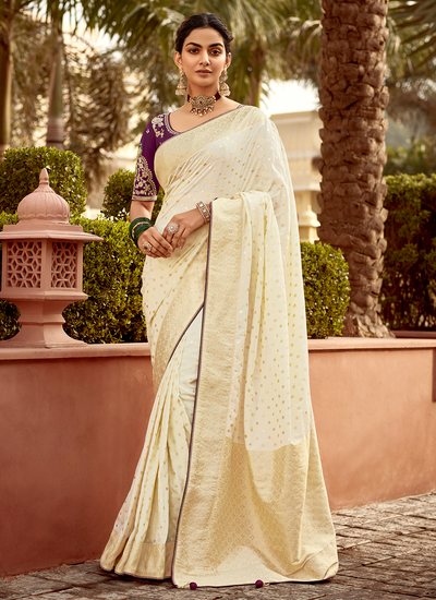 Party Wear Cream Dola Silk Zari Woven Saree With Heavy Embroidery Blouse