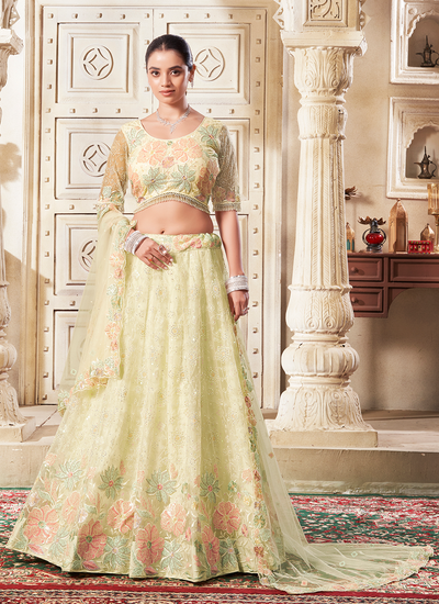 Light Yellow Heavy Sequins Embroidered Premium Net Engagement Lehenga Choli