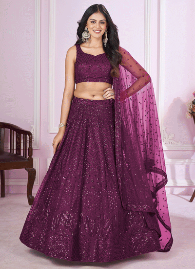 Sequins Embroidered Georgette Wedding Wear Lehenga Choli In Purple