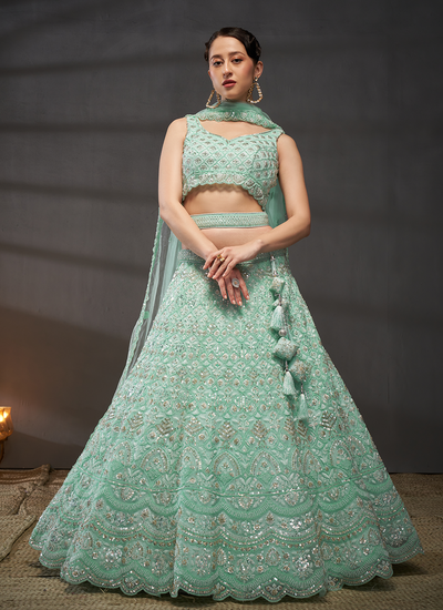 Turquoise Sequins Embroidery Party Wear Net Lehenga Choli