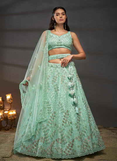 Turquoise Sequins Embroidery Net Party Wear Lehenga Choli