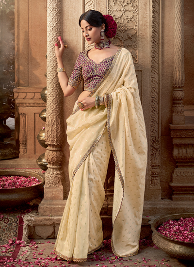 Beige Viscose Festive Wear Zari Woven Saree With Contrast Embroidered Blouse