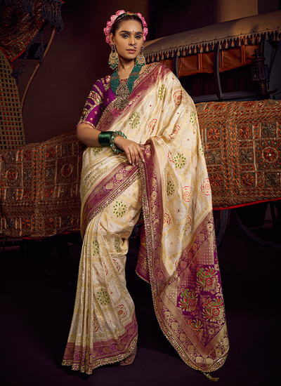 Reception Wear Viscose Dola Silk Cream Woven Saree With Purple Handwork Embroidered Blouse