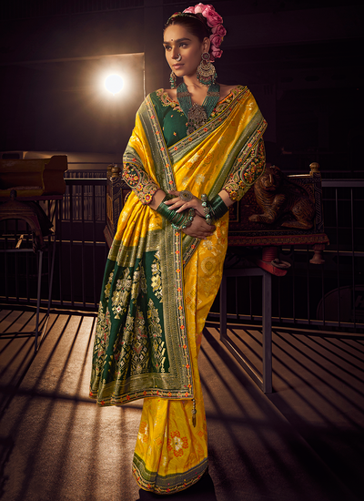 Yellow Woven Viscose Dola Silk Haldi Wear Saree With Handwork Embroidered Green Blouse