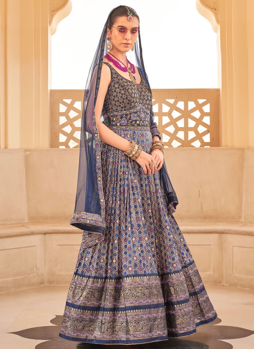 Foil Printed Pv Silk Engagement Wear Gown With Dupatta In Blue