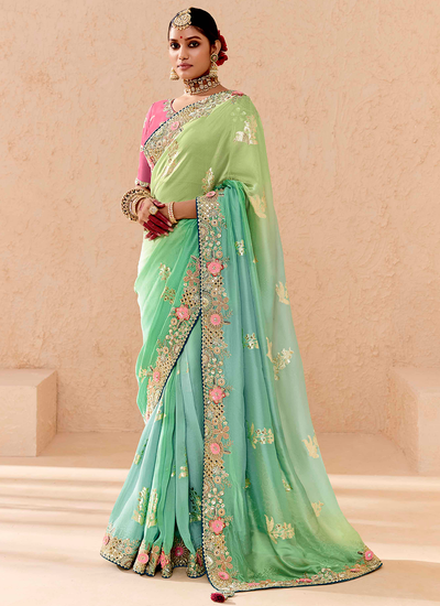 Mint Green And Turquoise Dola Silk Wedding Wear Sequins Embroidered Zari Woven Saree