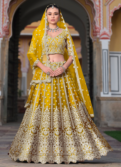 Yellow Sequins Embroidered Engagement Wear Butterfly Net Lehenga Choli